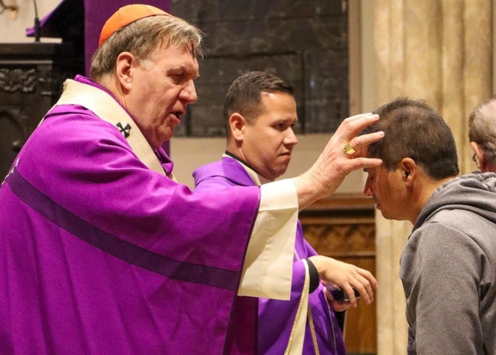 Cardinal Joseph W. Tobin, Archbishop of Newark, places ashes on a parishioner’s forehead during an Ash Wednesday Mass at St. Patrick’s Pro-Cathedral in Newark on February 22, 2023. (Photo by Archdiocese of Newark/Marianela Guerrero)